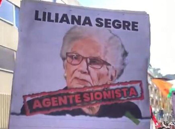 “segre-agente-sionista”,-a-corteo-pro-pal-a-milano-cartelli-contro-la-senatrice-a-vita