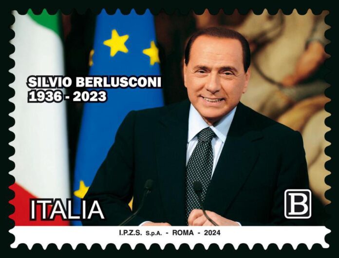 berlusconi,-un-francobollo-in-ricordo-del-cav:-ritratto-tra-bandiere-italia-e-ue